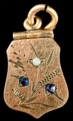 Victorian Yellow Gold Tone Shield Shaped Miniature Hinged Locket Pendant. A miniature hinged 