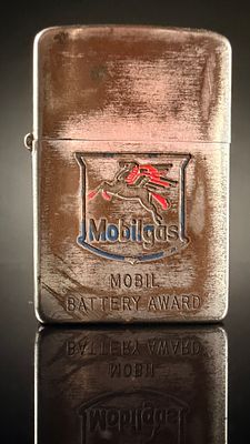 Vintage Zippo Mobilgas Battery Award Pocket Lighter. A vintage windproof pocket lighter 