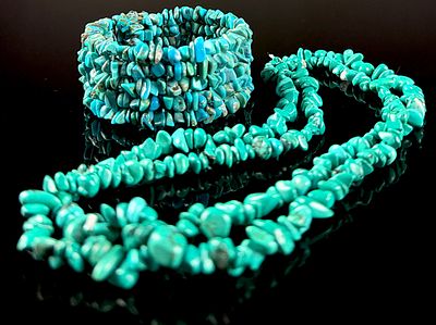 Two Turquoise-Colored Stone Chip Jewelry Items: A Necklace and Multi-Row Coil Bracelet. This 