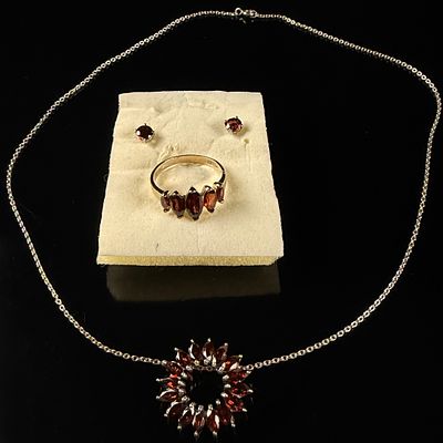 A Set of Sterling Silver and Vermeil Jewelry Featuring Garnet-Tone Stones. This collection 