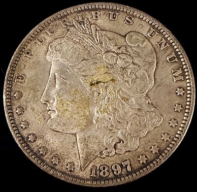 US 1897 Morgan Silver Dollar. US 1897 Morgan silver dollar, Philadelphia Mint issue. This 