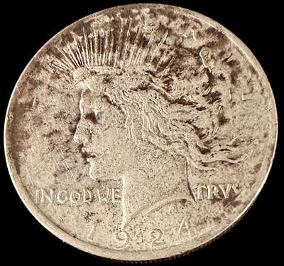 US 1924 Peace Silver Dollar. A 1924 US Peace silver dollar, cataloged as KM# 150. This specimen 