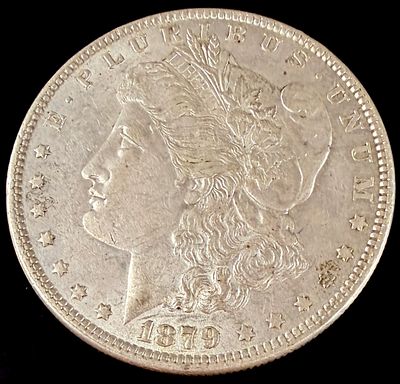 US 1879 Morgan Silver Dollar. US 1879 Morgan silver dollar, Philadelphia Mint. This specimen is 