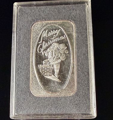 1 Troy Ounce .999 Fine Silver Merry Christmas Art Bar. Attributed to the Madison Mint, this is a 