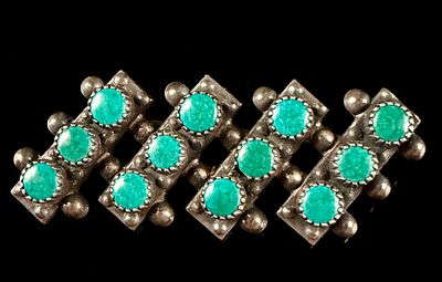 Vintage Navajo Sterling Silver and Turquoise Brooch. A vintage Southwestern style brooch 