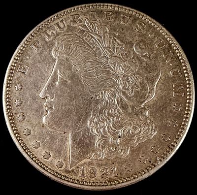 US 1921-D Morgan Silver Dollar. This is a 1921 US Morgan silver dollar struck at the Denver 