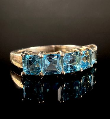 Annabella by TGGC Swiss Blue Topaz and Sterling Silver Five-Stone Ring. This five-stone gemstone 