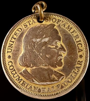 US 1893 Columbian Exposition Commemorative Half Dollar Pendant. This jewelry item features a US 
