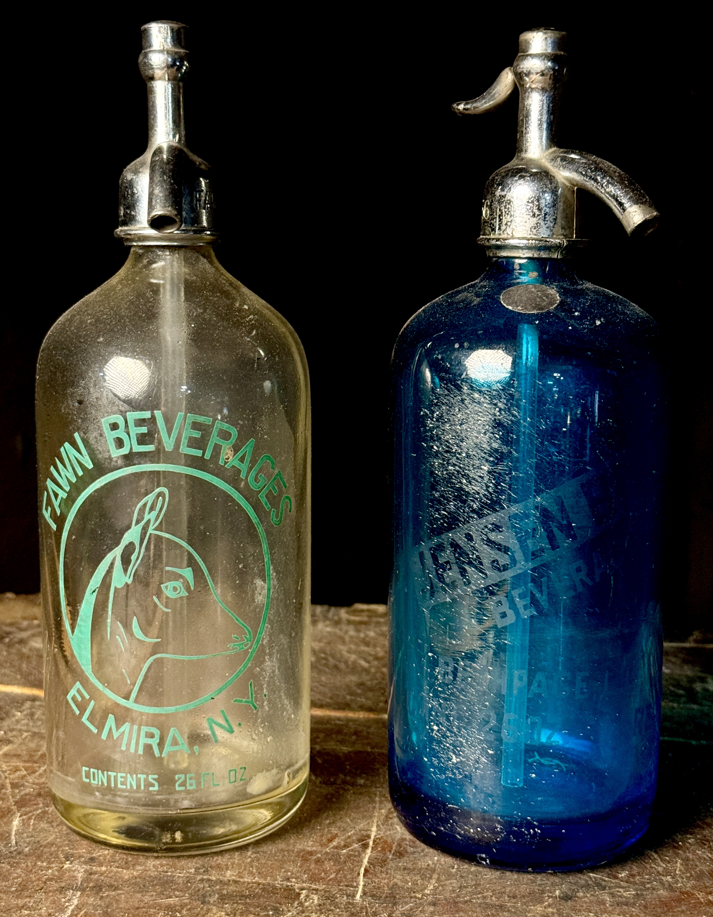 Two Vintage New York Glass Seltzer Siphon Bottles including Fawn Beverages and Jensen Beverages