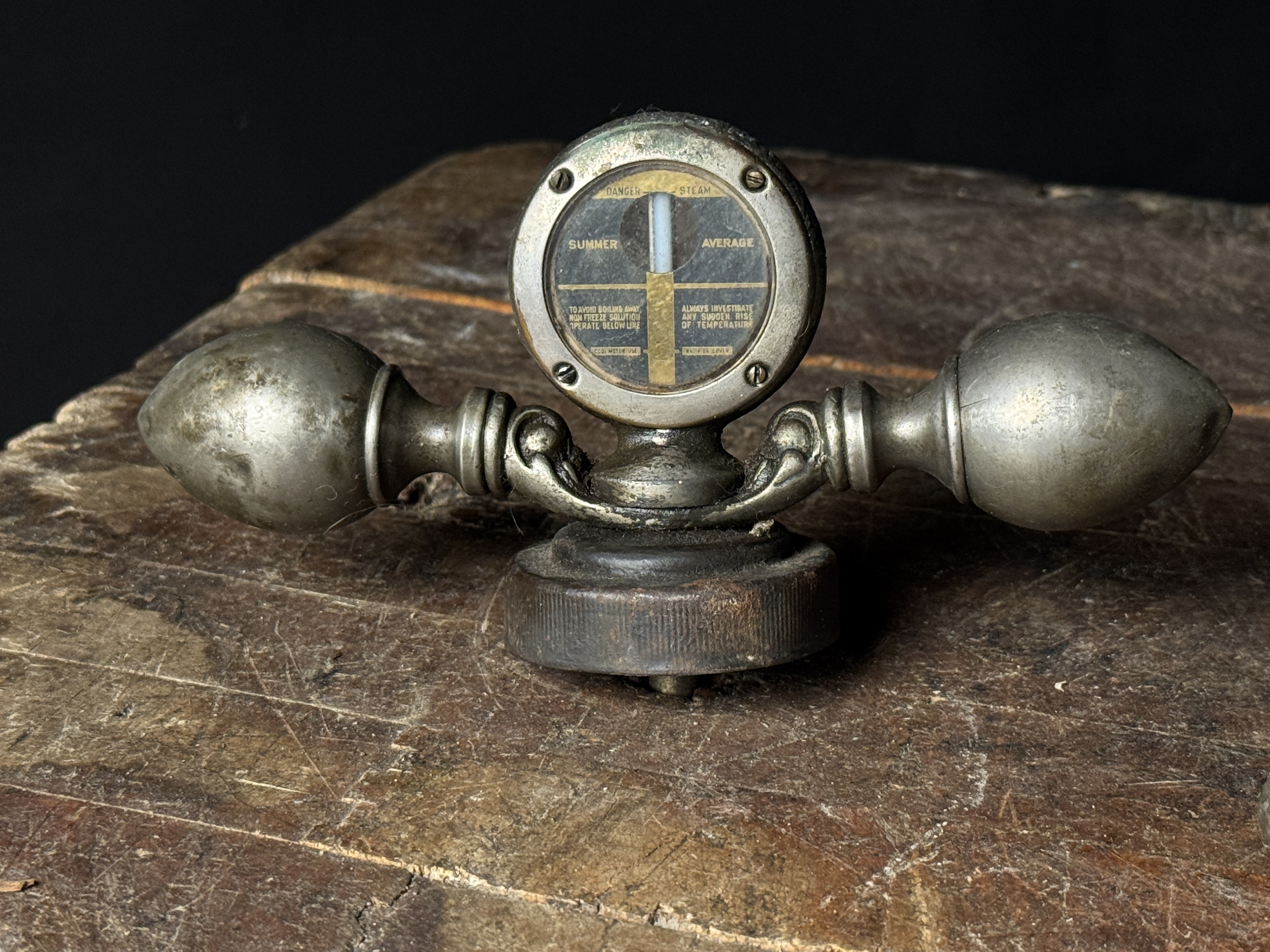 A Trio of Vintage Boyce Moto-Meter Radiator Caps and Temperature Gauges