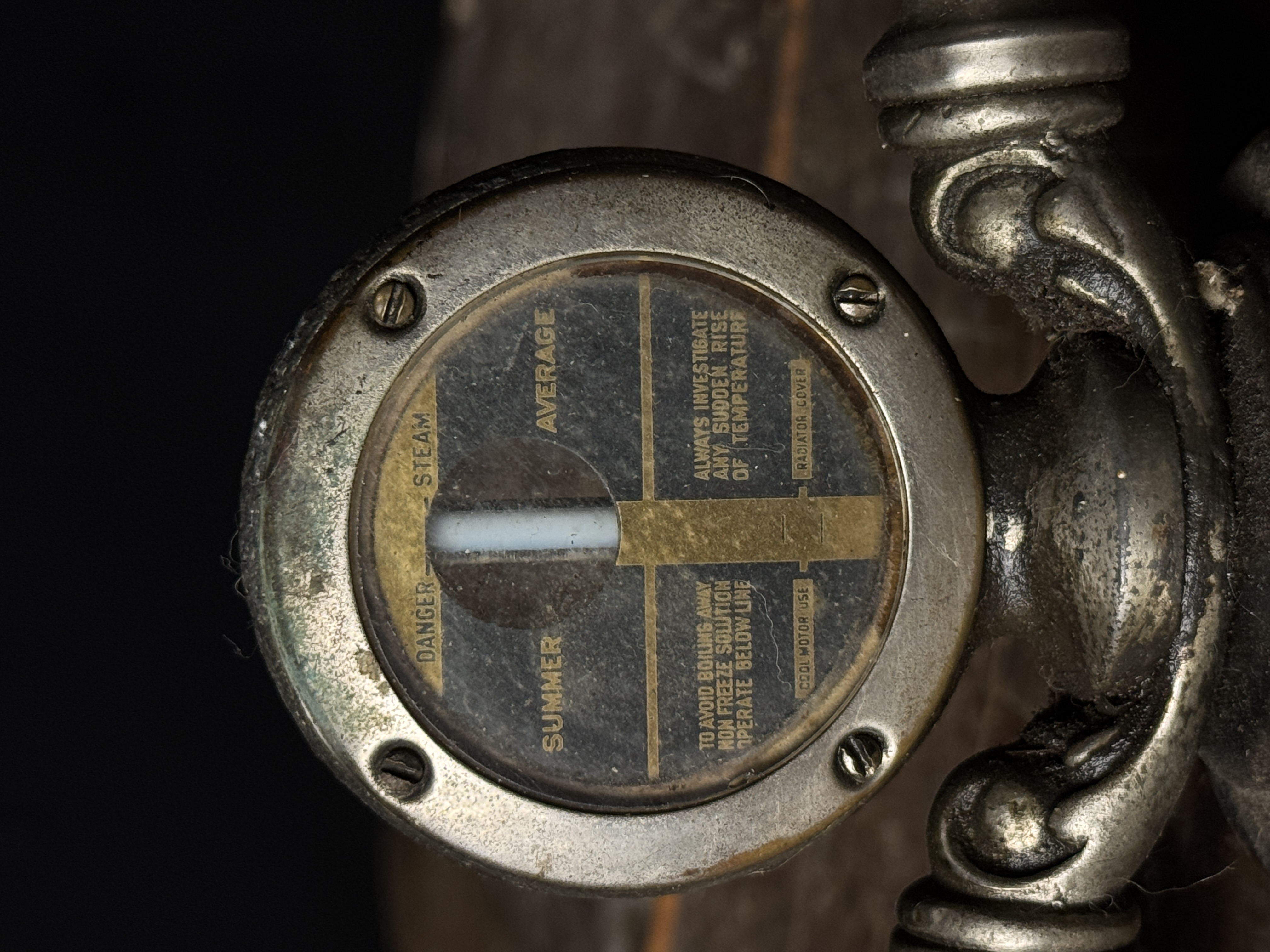 A Trio of Vintage Boyce Moto-Meter Radiator Caps and Temperature Gauges