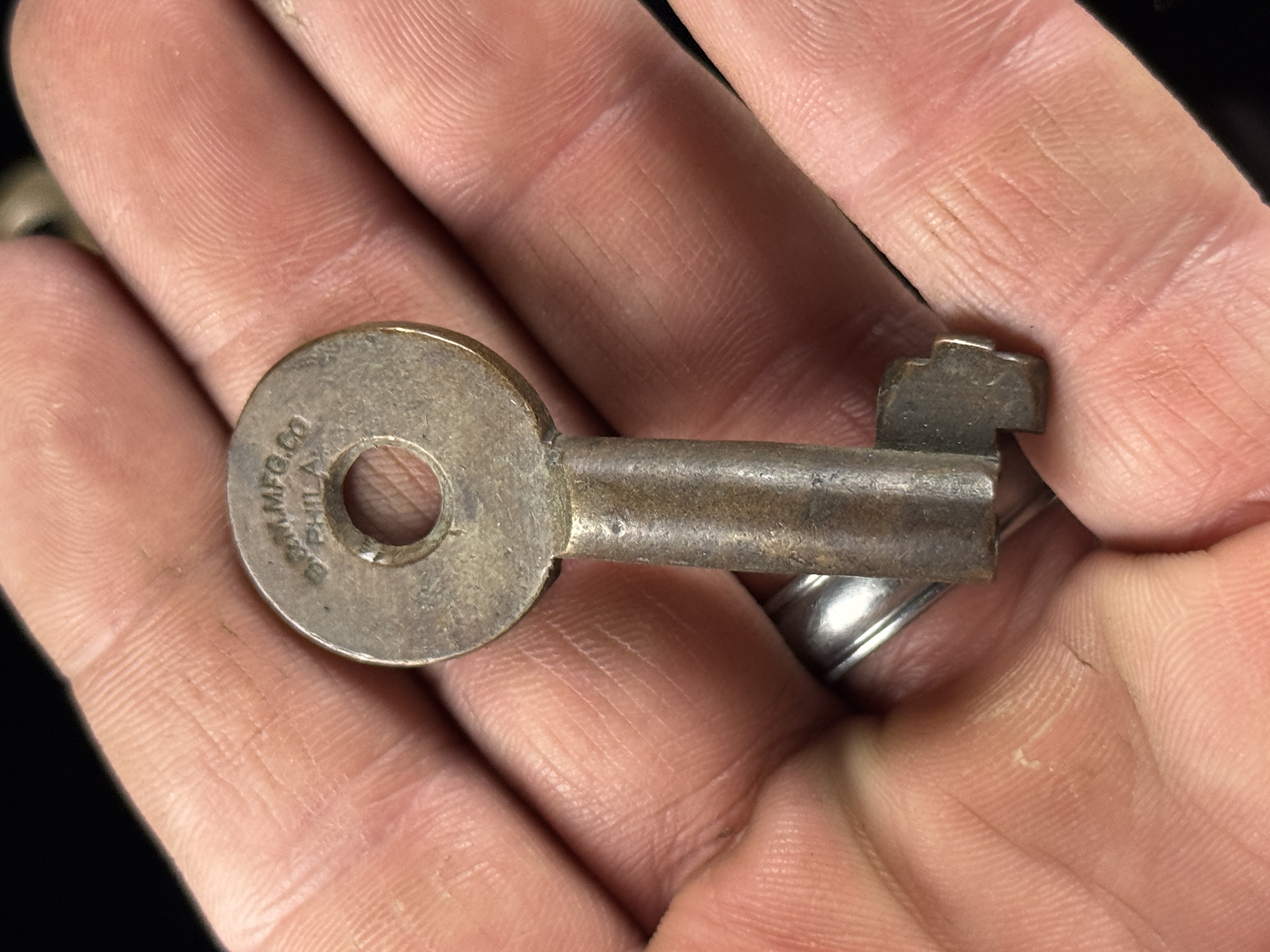 An Assortment of Antique Brass Railroad and Industrial Cabinet Keys including S.R.M. Mfg. Co.
