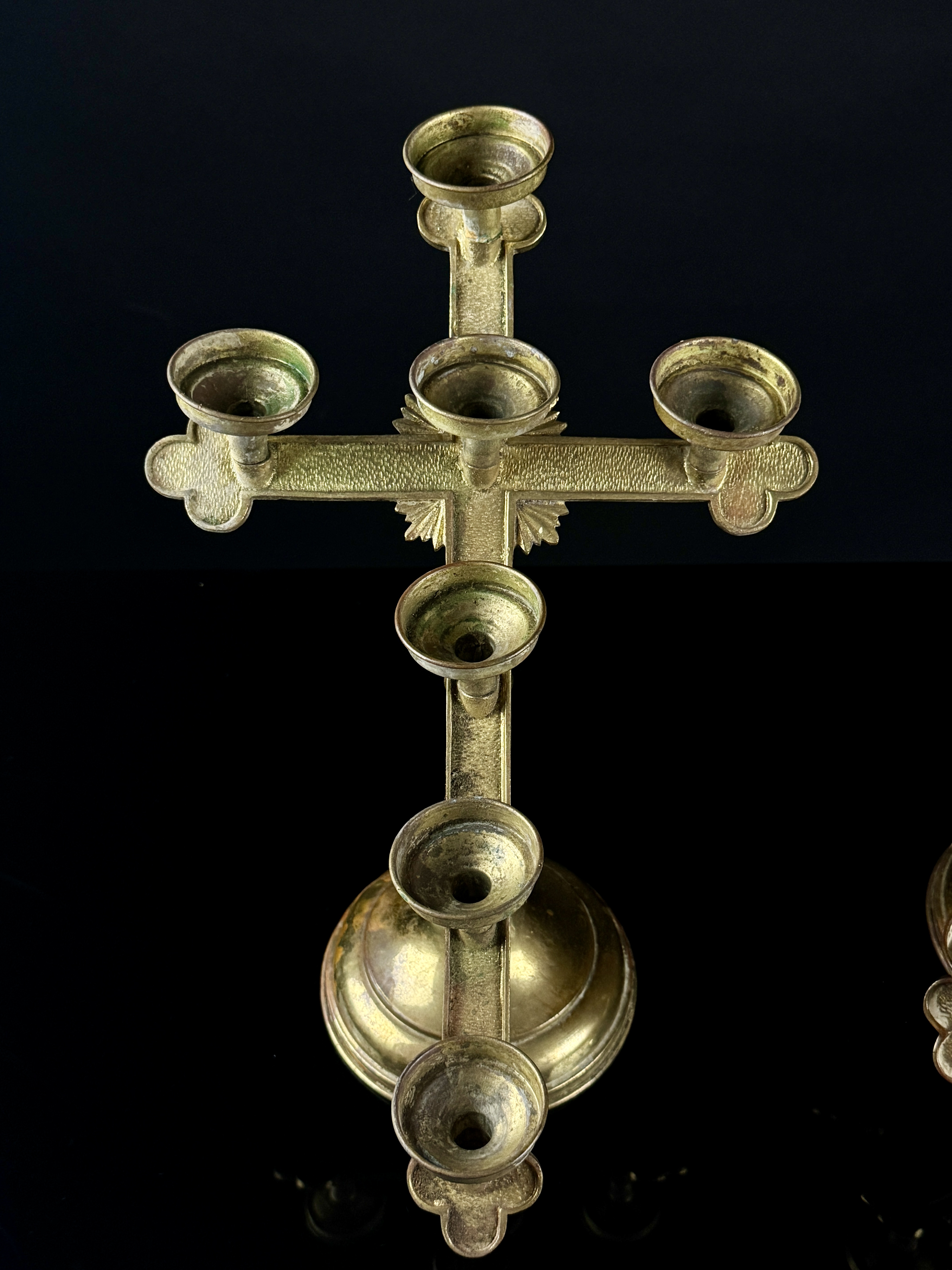 A Pair of Gothic Revival Brass Seven-Light Adjustable Altar Candelabra
