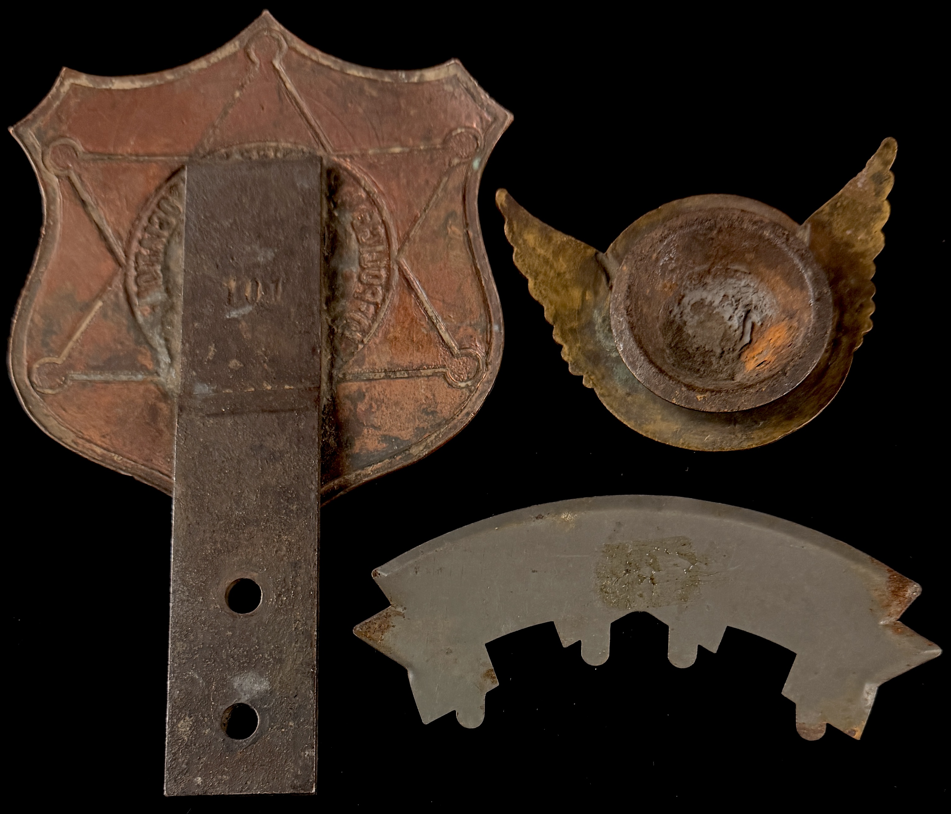 A Trio of Vintage Automotive Grille and Radiator Emblems including REO Motor Car Company