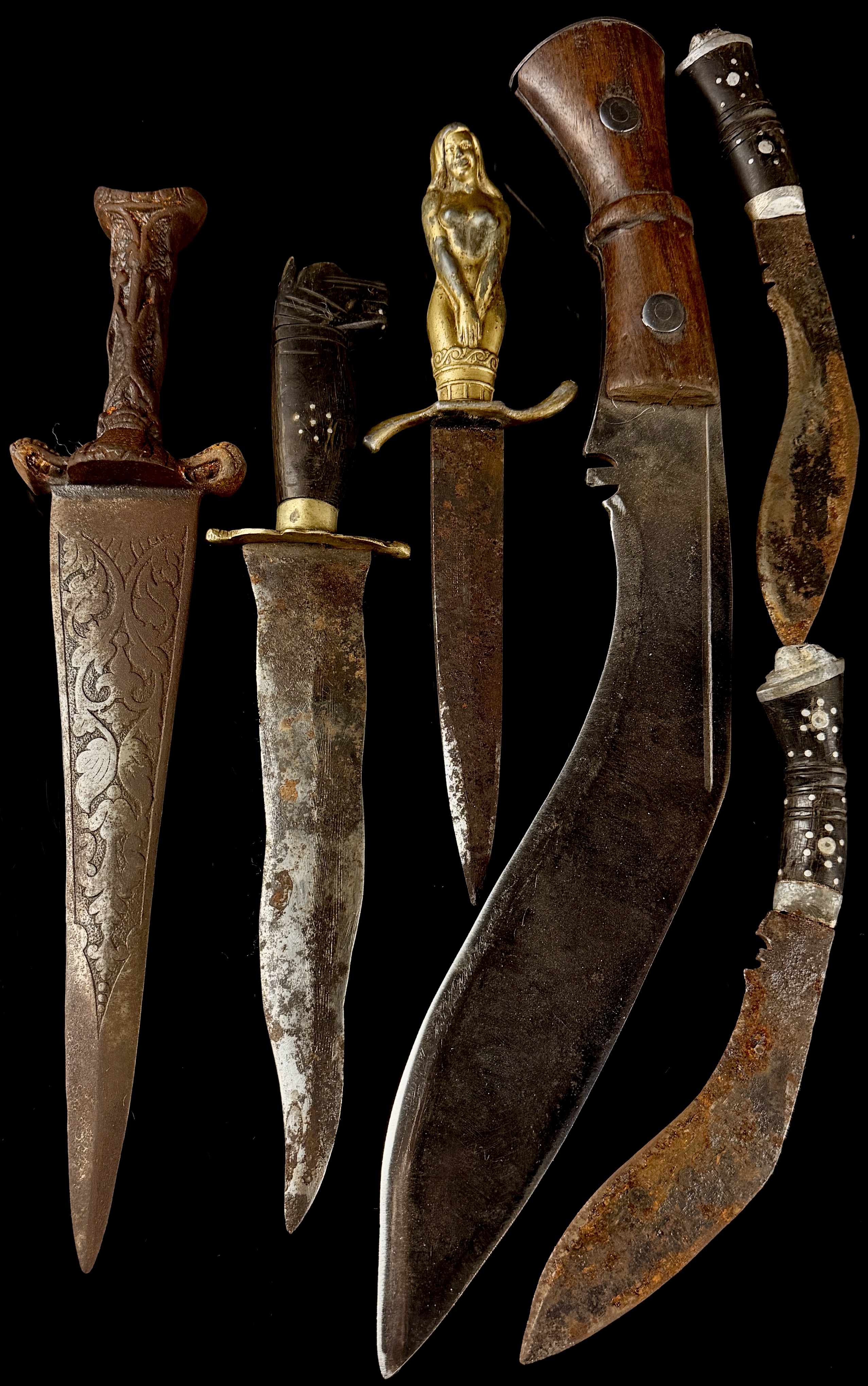 An Assortment of Vintage and Antique Edged Weapons Including British Military Kukri and German Novelty Dagger
