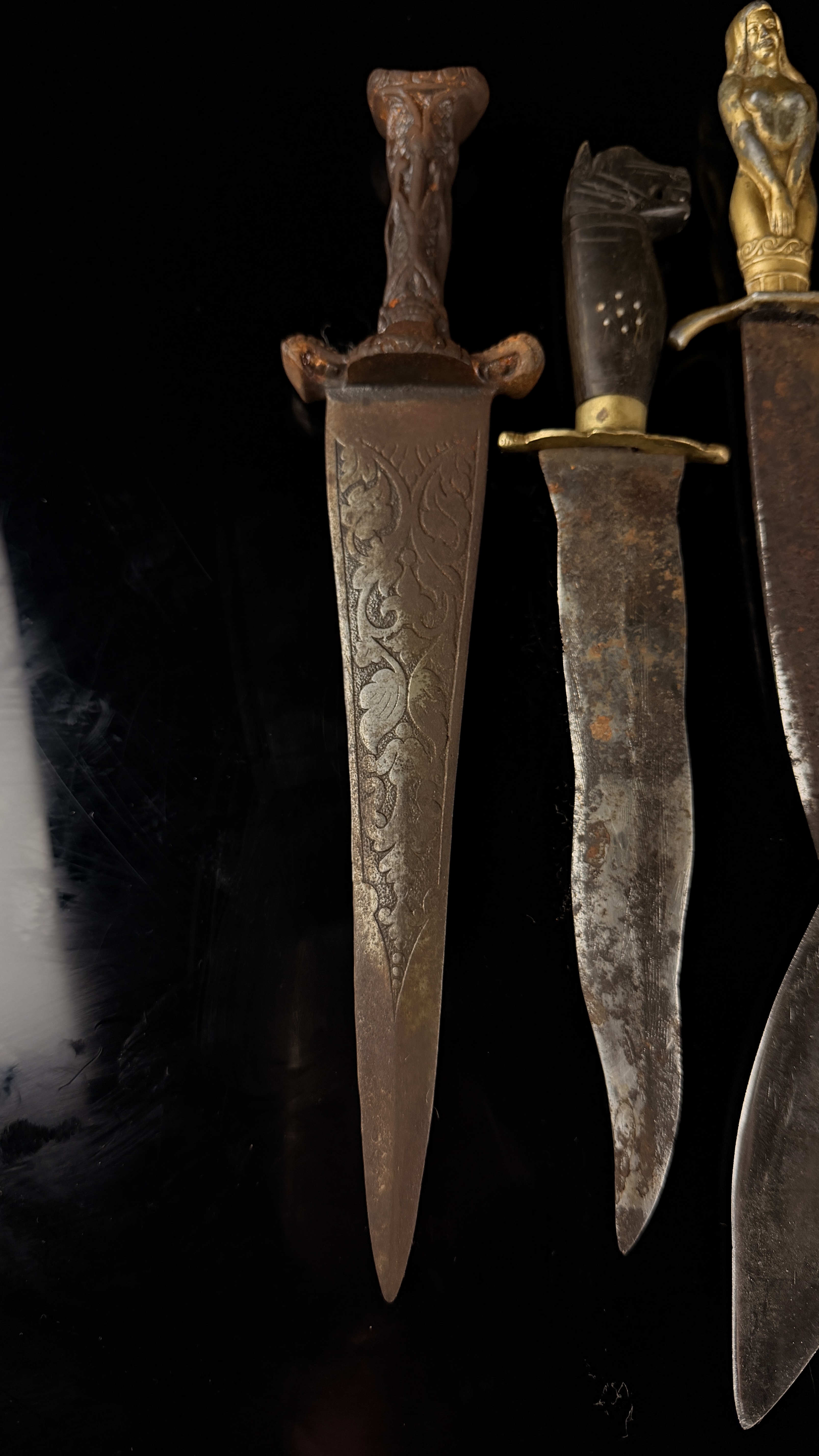 An Assortment of Vintage and Antique Edged Weapons Including British Military Kukri and German Novelty Dagger