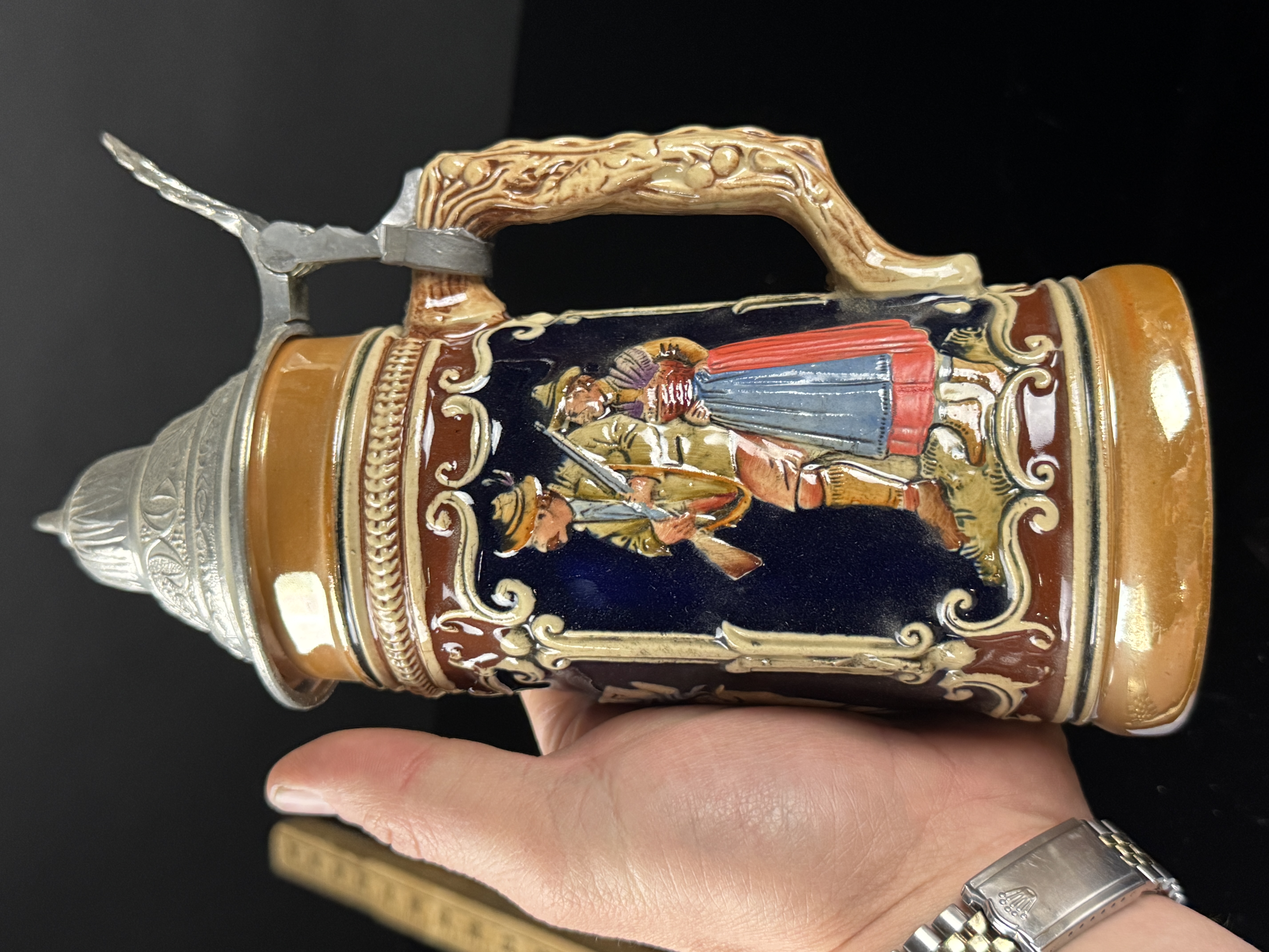 An Assortment of Four German and English Steins and Mugs