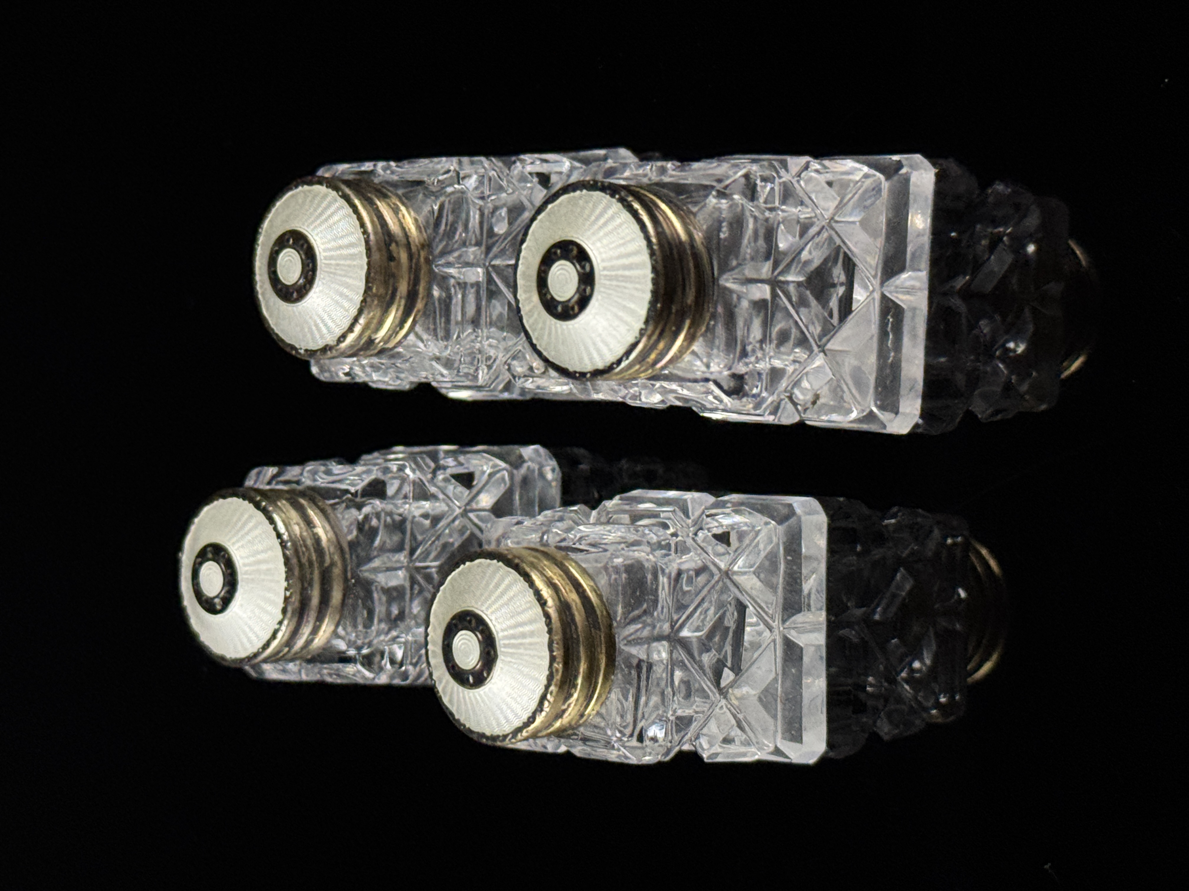 A Pair of Norwegian Sterling Silver Vermeil and Cut Crystal Miniature Salt and Pepper Shakers