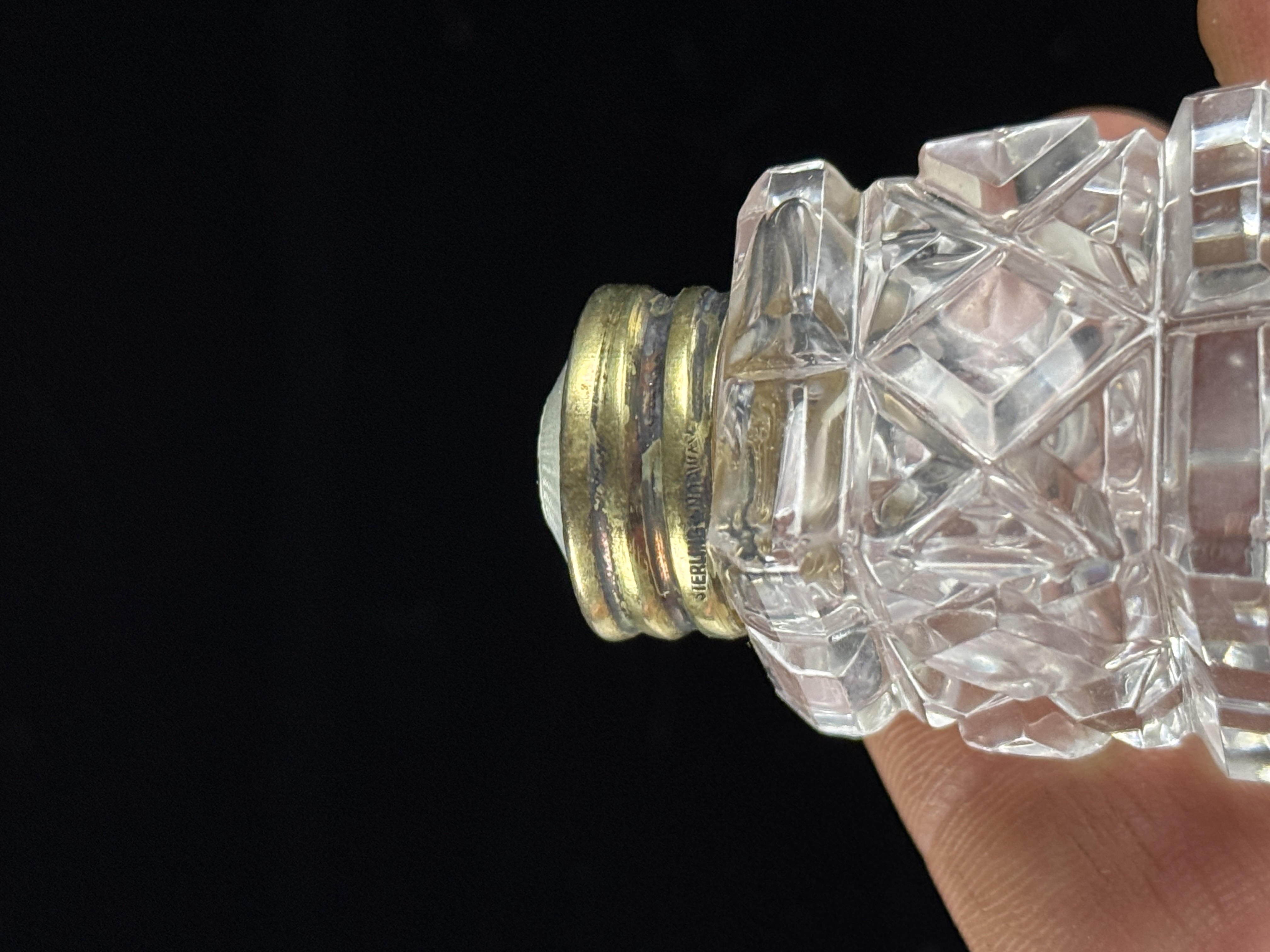 A Pair of Norwegian Sterling Silver Vermeil and Cut Crystal Miniature Salt and Pepper Shakers