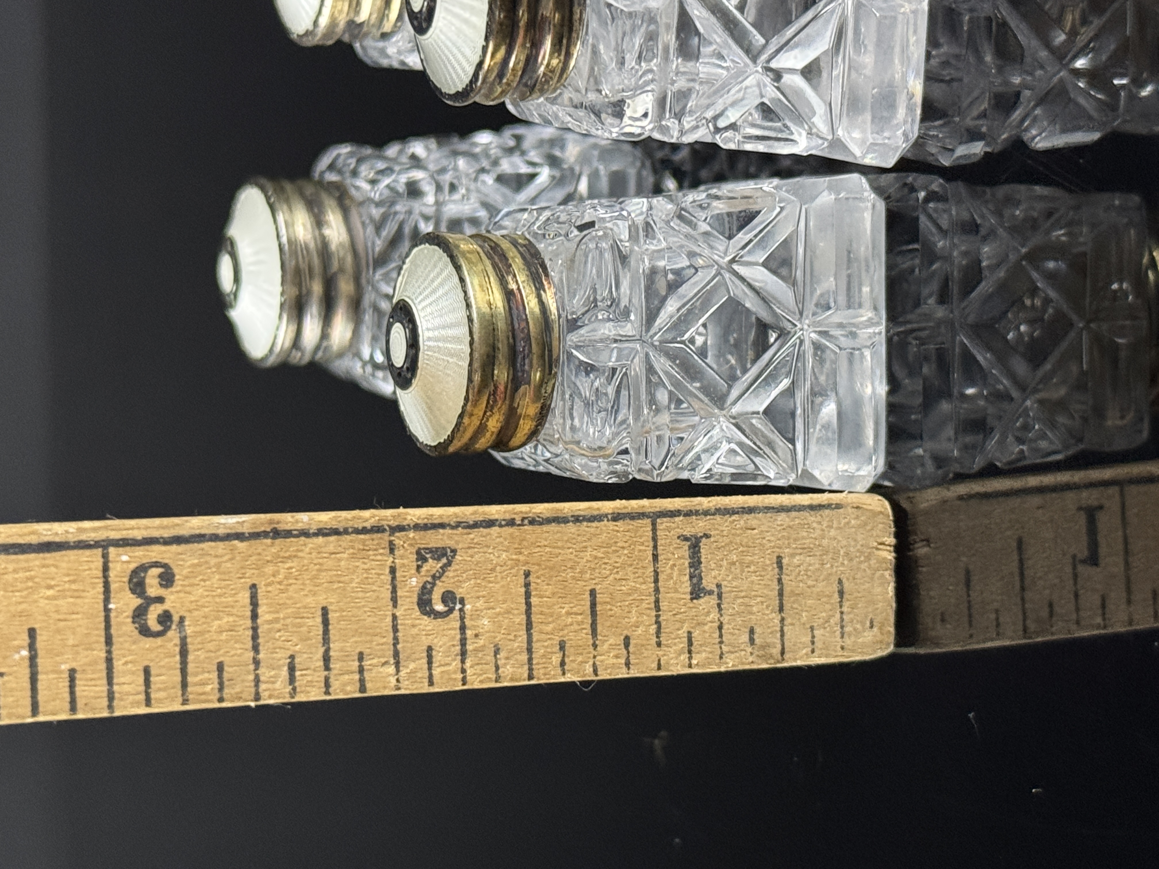 A Pair of Norwegian Sterling Silver Vermeil and Cut Crystal Miniature Salt and Pepper Shakers
