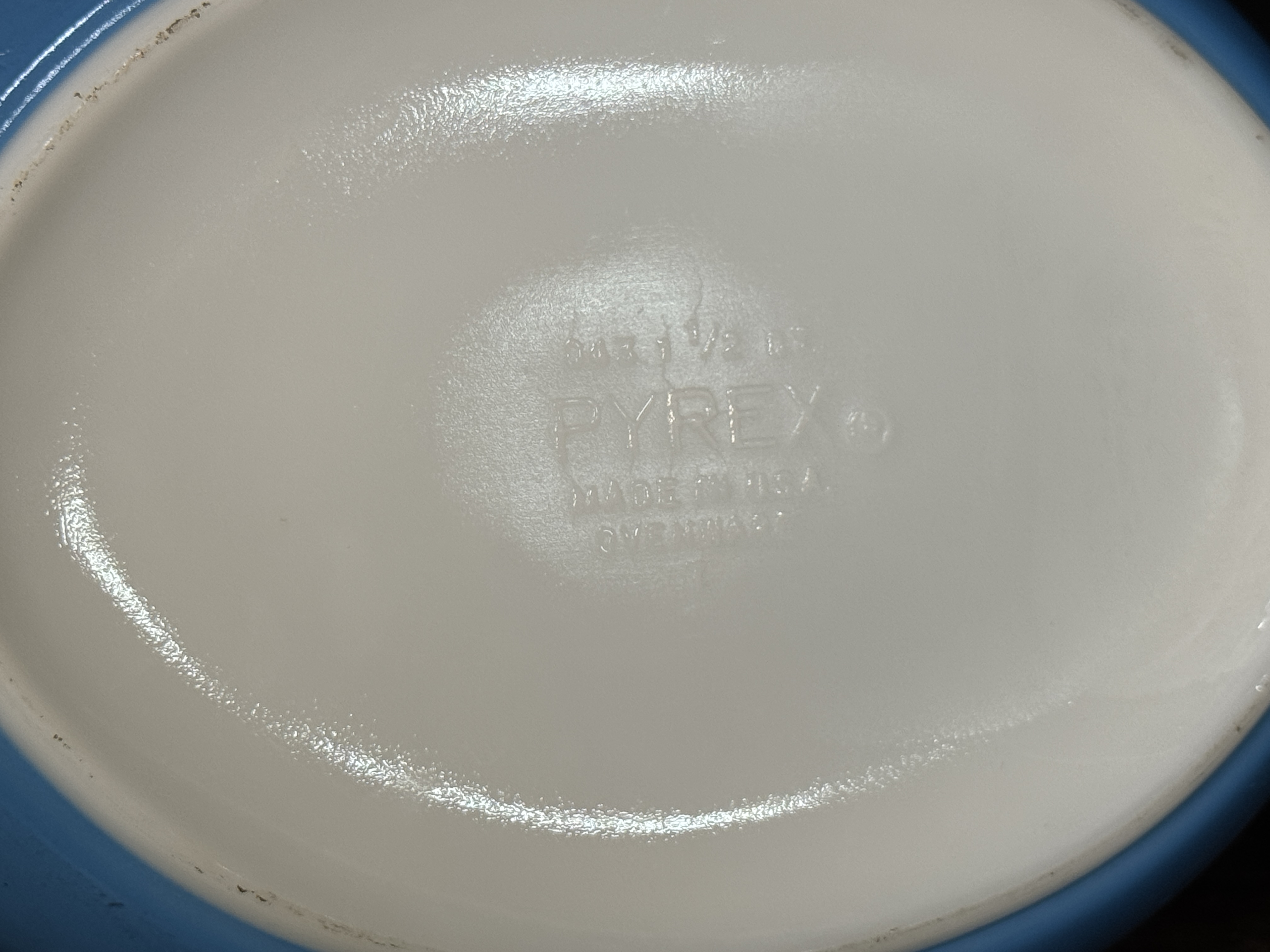 A Collection of Vintage Pyrex and Fire-King Primary Colors, Snowflake Garland, and Tulip Pattern Ovenware