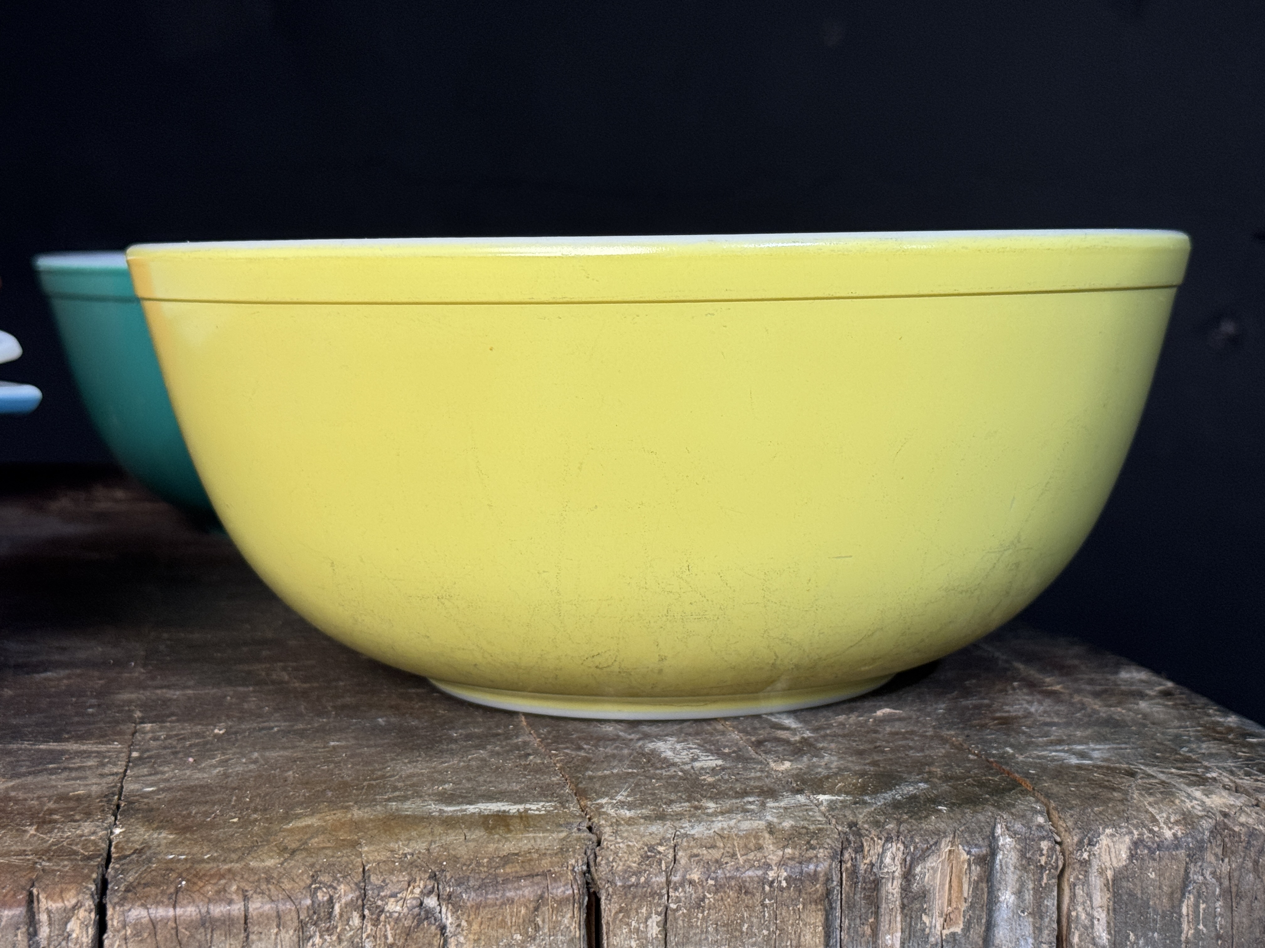 A Collection of Vintage Pyrex and Fire-King Primary Colors, Snowflake Garland, and Tulip Pattern Ovenware