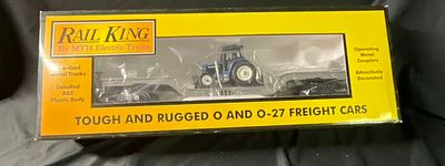 RailKing by MTH Electric Trains Item No 30-7611 Construction Flatcar with Ertl Tractor. This O 