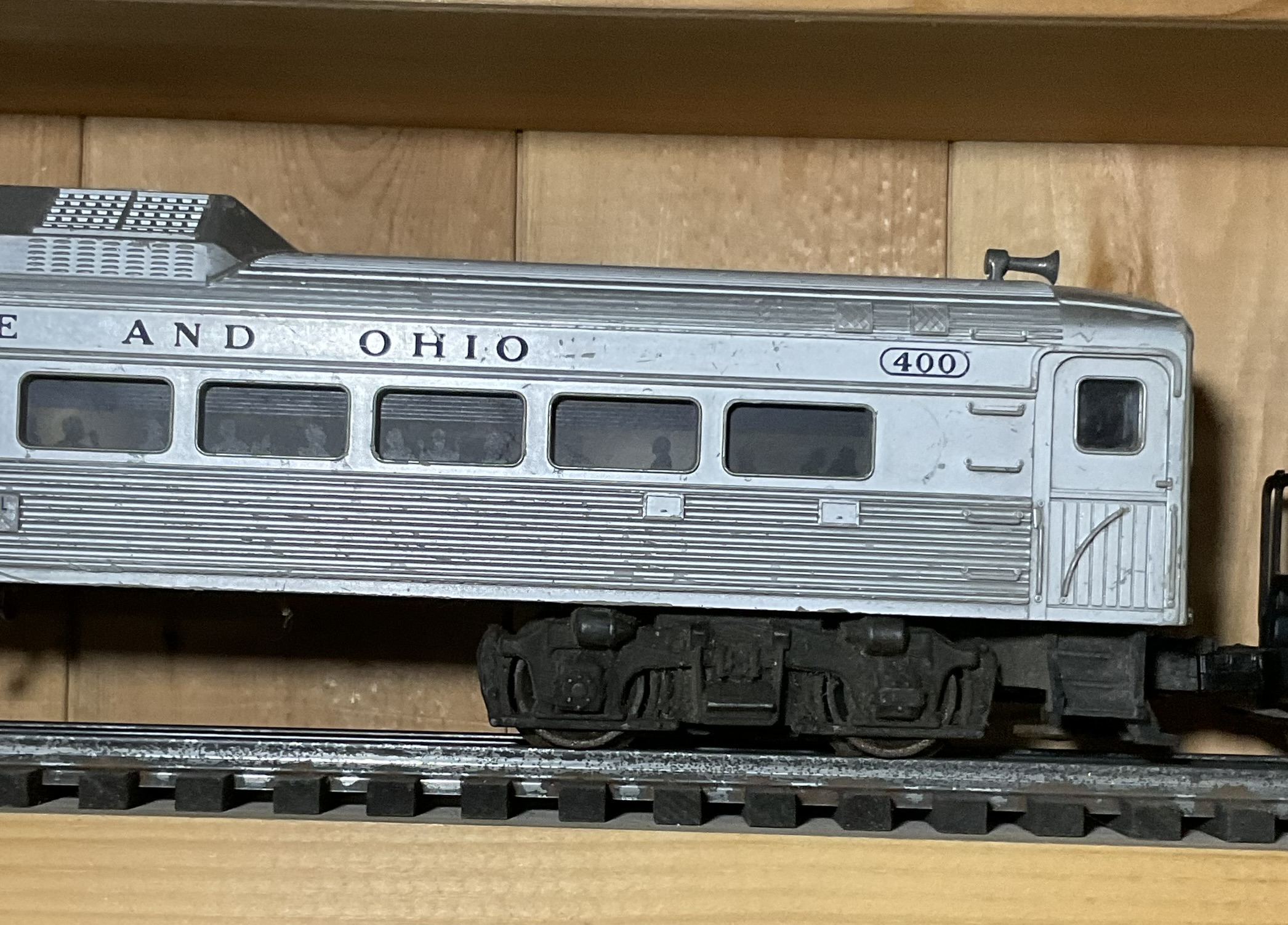 A Pair of Lionel O-Gauge Model Train Cars Including Baltimore and Ohio RDC-1 and Alaska Railroad Switcher No. 614