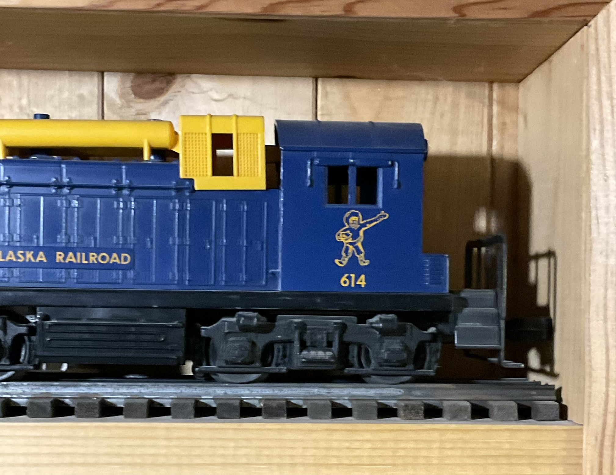 A Pair of Lionel O-Gauge Model Train Cars Including Baltimore and Ohio RDC-1 and Alaska Railroad Switcher No. 614