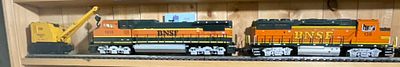Three O-Gauge Model Train Units Including Lionel 3360 Burro Crane and Two BNSF Diesel Locomotives. 