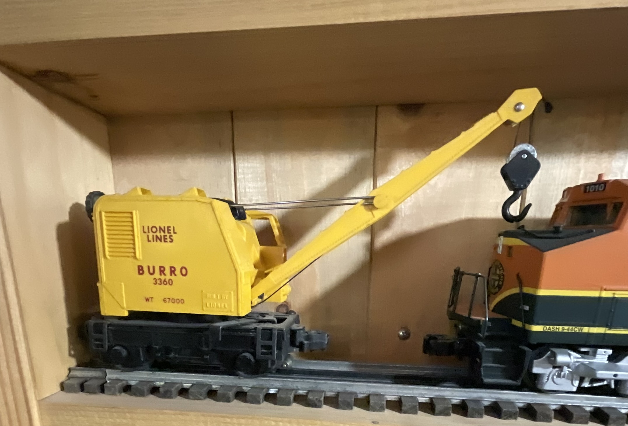 Three O-Gauge Model Train Units Including Lionel 3360 Burro Crane and Two BNSF Diesel Locomotives