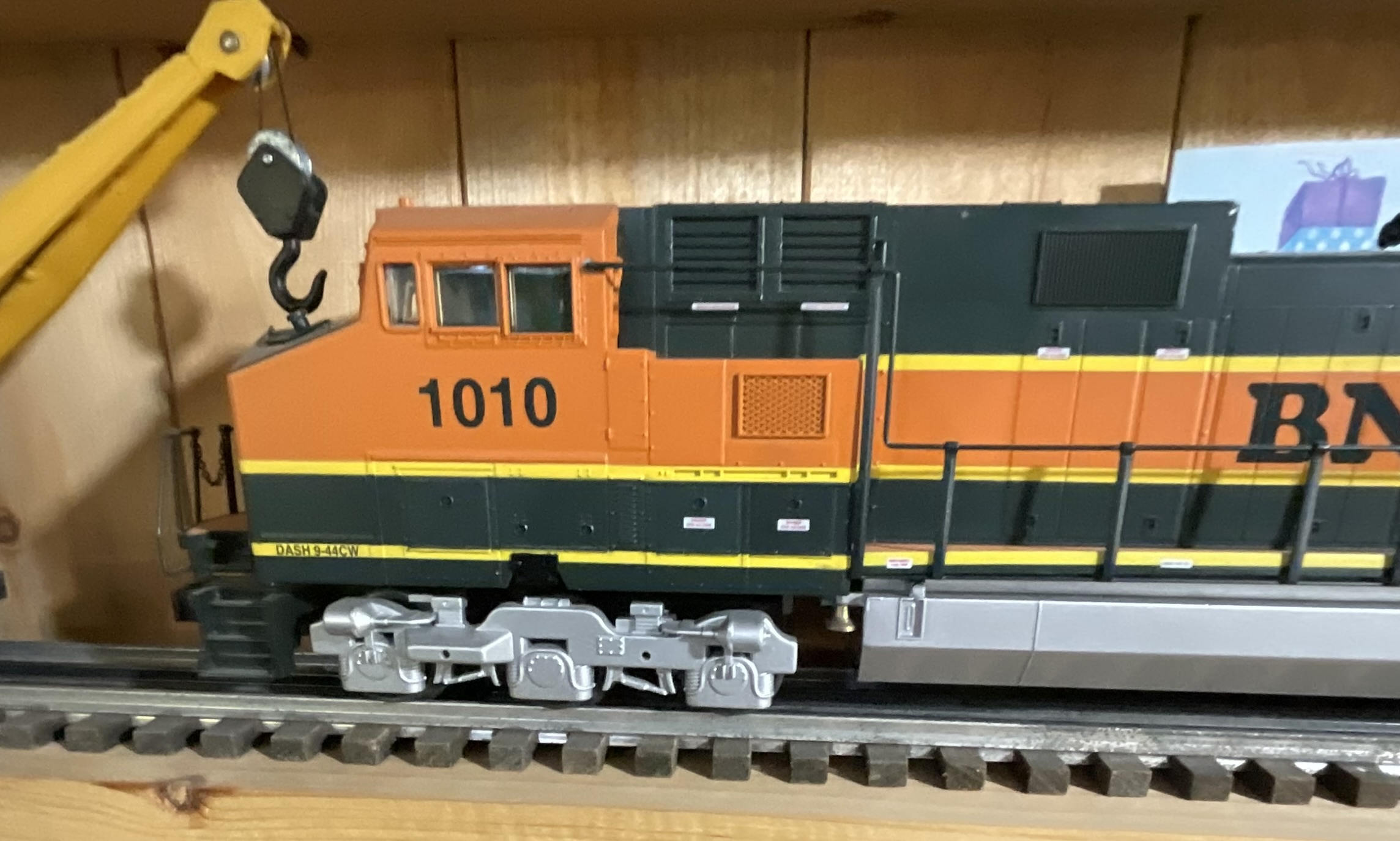 Three O-Gauge Model Train Units Including Lionel 3360 Burro Crane and Two BNSF Diesel Locomotives