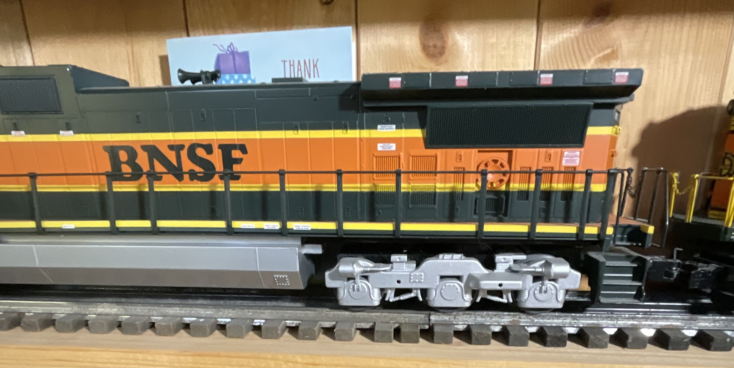 Three O-Gauge Model Train Units Including Lionel 3360 Burro Crane and Two BNSF Diesel Locomotives