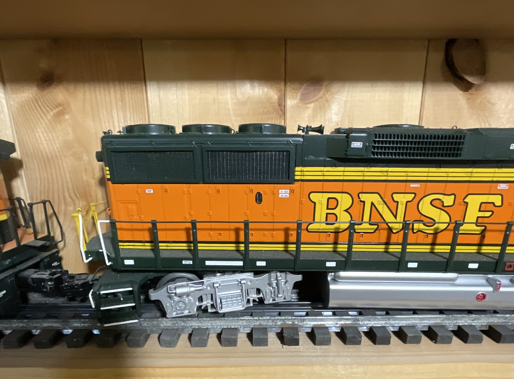 Three O-Gauge Model Train Units Including Lionel 3360 Burro Crane and Two BNSF Diesel Locomotives