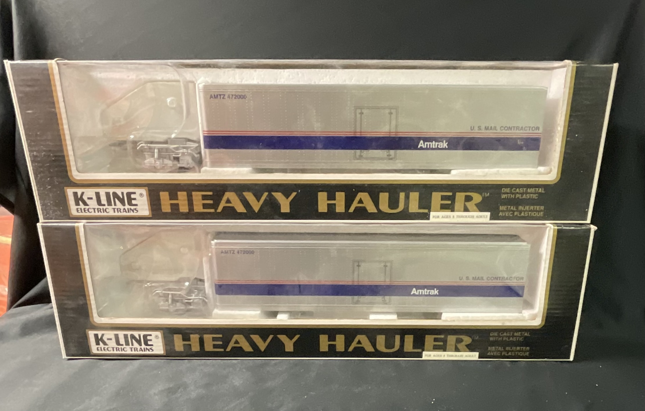 A Pair of K-Line Heavy Hauler Amtrak Model Tractor-Trailers in Original Boxes