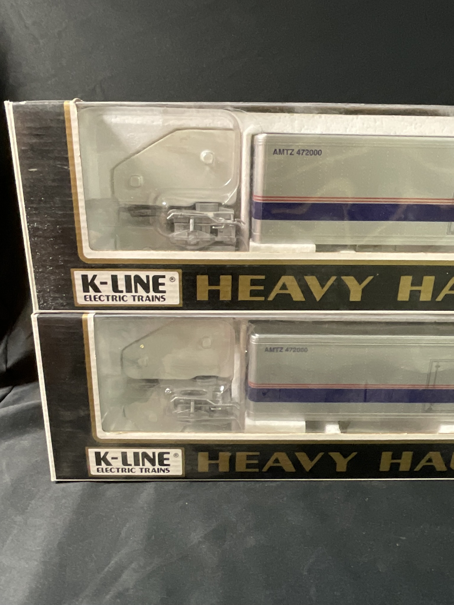 A Pair of K-Line Heavy Hauler Amtrak Model Tractor-Trailers in Original Boxes