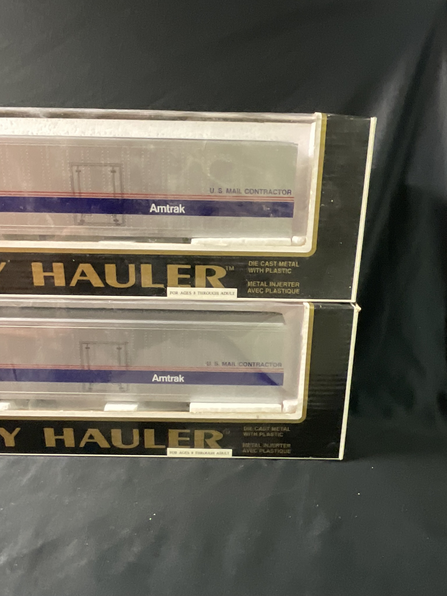 A Pair of K-Line Heavy Hauler Amtrak Model Tractor-Trailers in Original Boxes