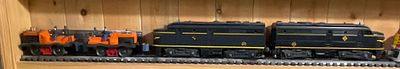 A Collection of Lionel O-Gauge Erie Alco Diesel Locomotives and No. 50 Gang Cars. Manufactured 
