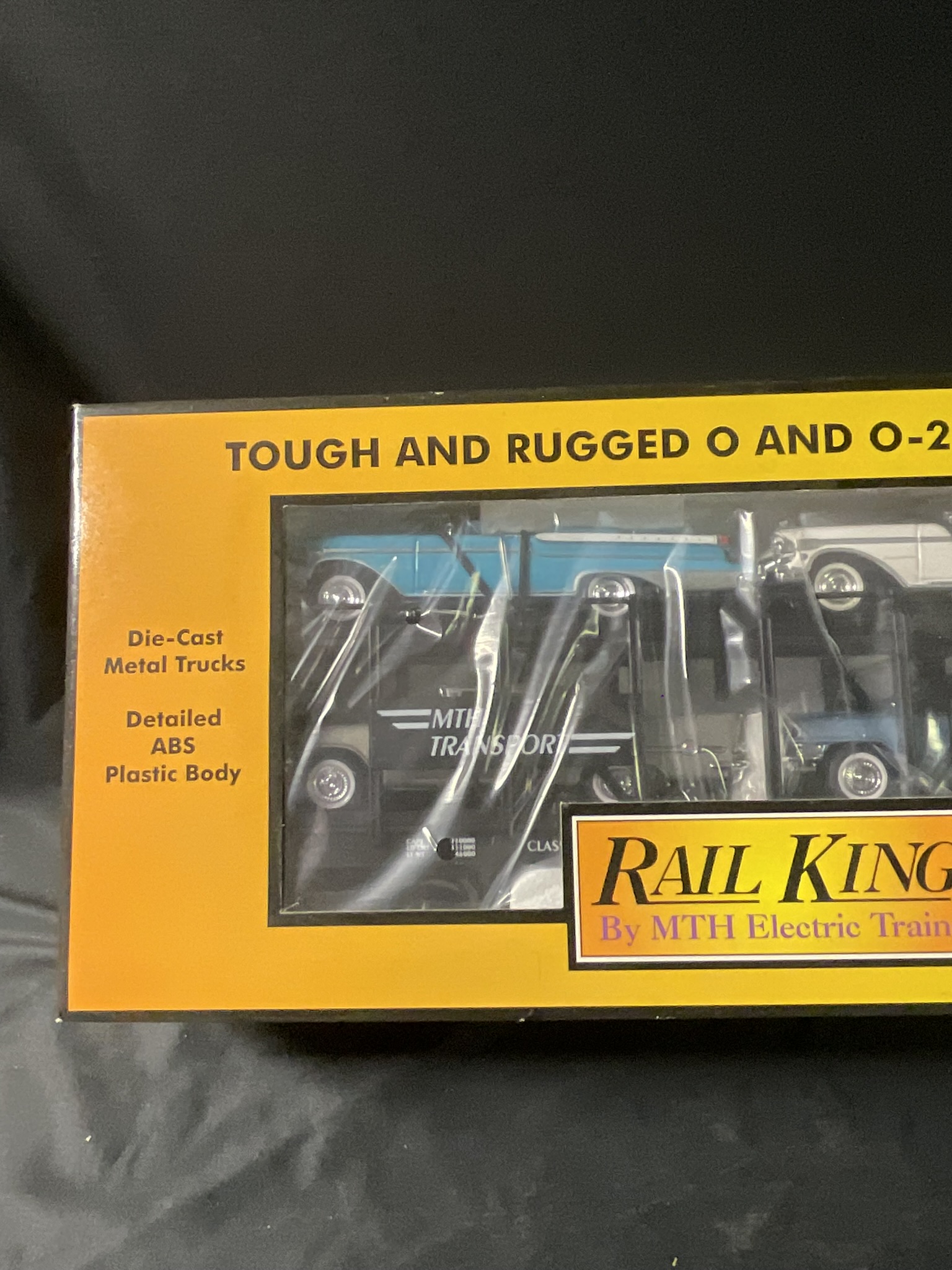 MTH RailKing 30-7676 Double Deck Auto Carrier with ERTL Automobiles