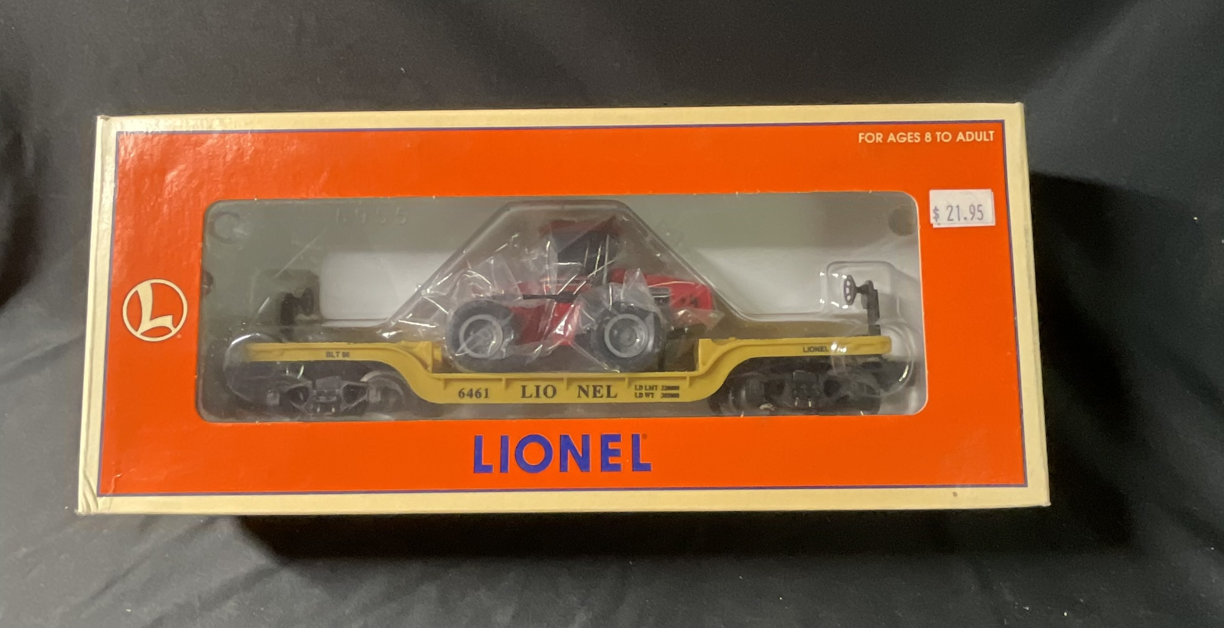 Lionel 6-16957 Depressed-Center Flatcar with Ertl Case 4WD Tractor