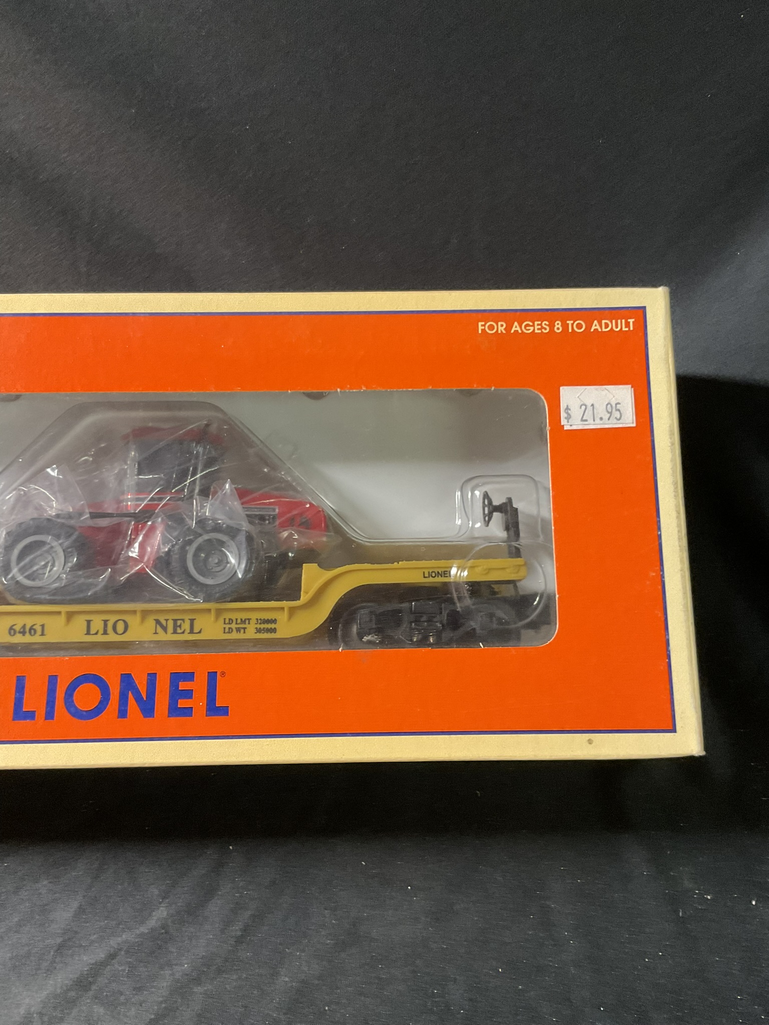 Lionel 6-16957 Depressed-Center Flatcar with Ertl Case 4WD Tractor