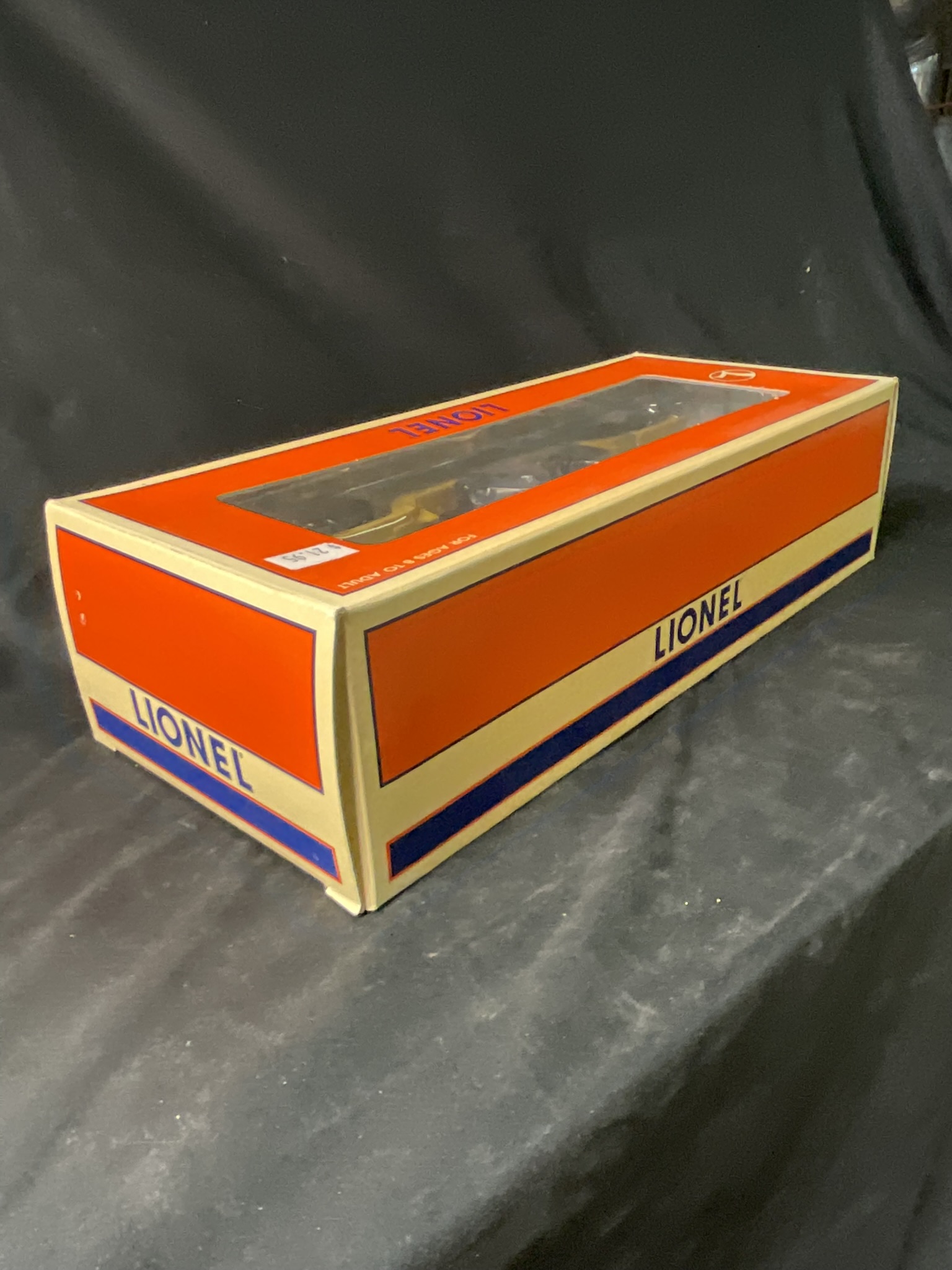 Lionel 6-16957 Depressed-Center Flatcar with Ertl Case 4WD Tractor