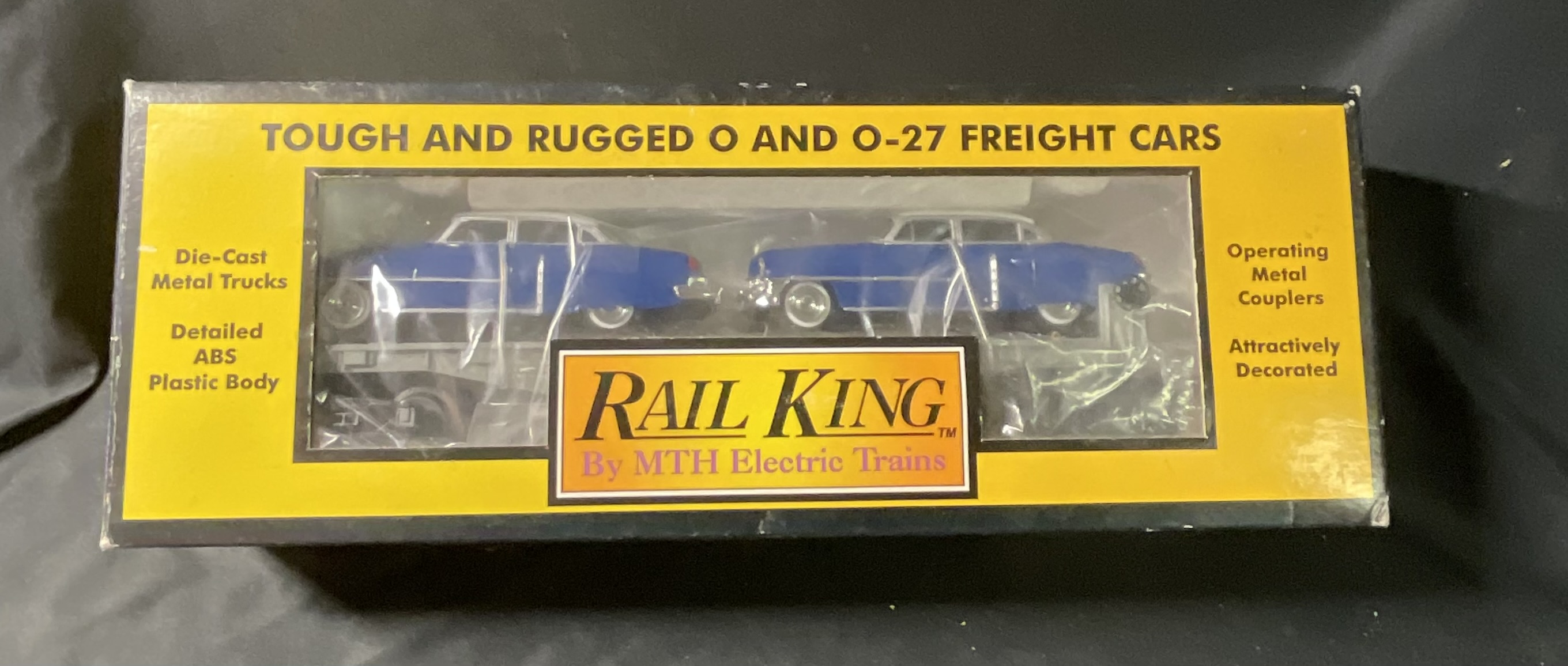 M.T.H. RailKing O-Gauge Semi-Scale Flat Car with a Pair of Ertl 1952 Cadillacs Item RK-7607L