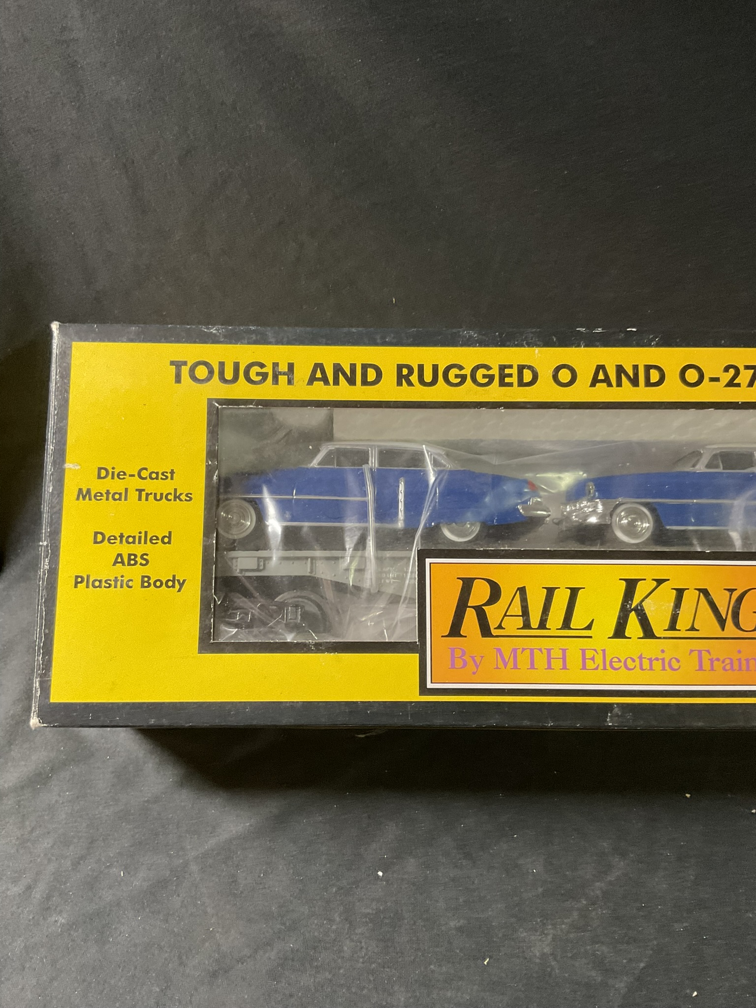 M.T.H. RailKing O-Gauge Semi-Scale Flat Car with a Pair of Ertl 1952 Cadillacs Item RK-7607L