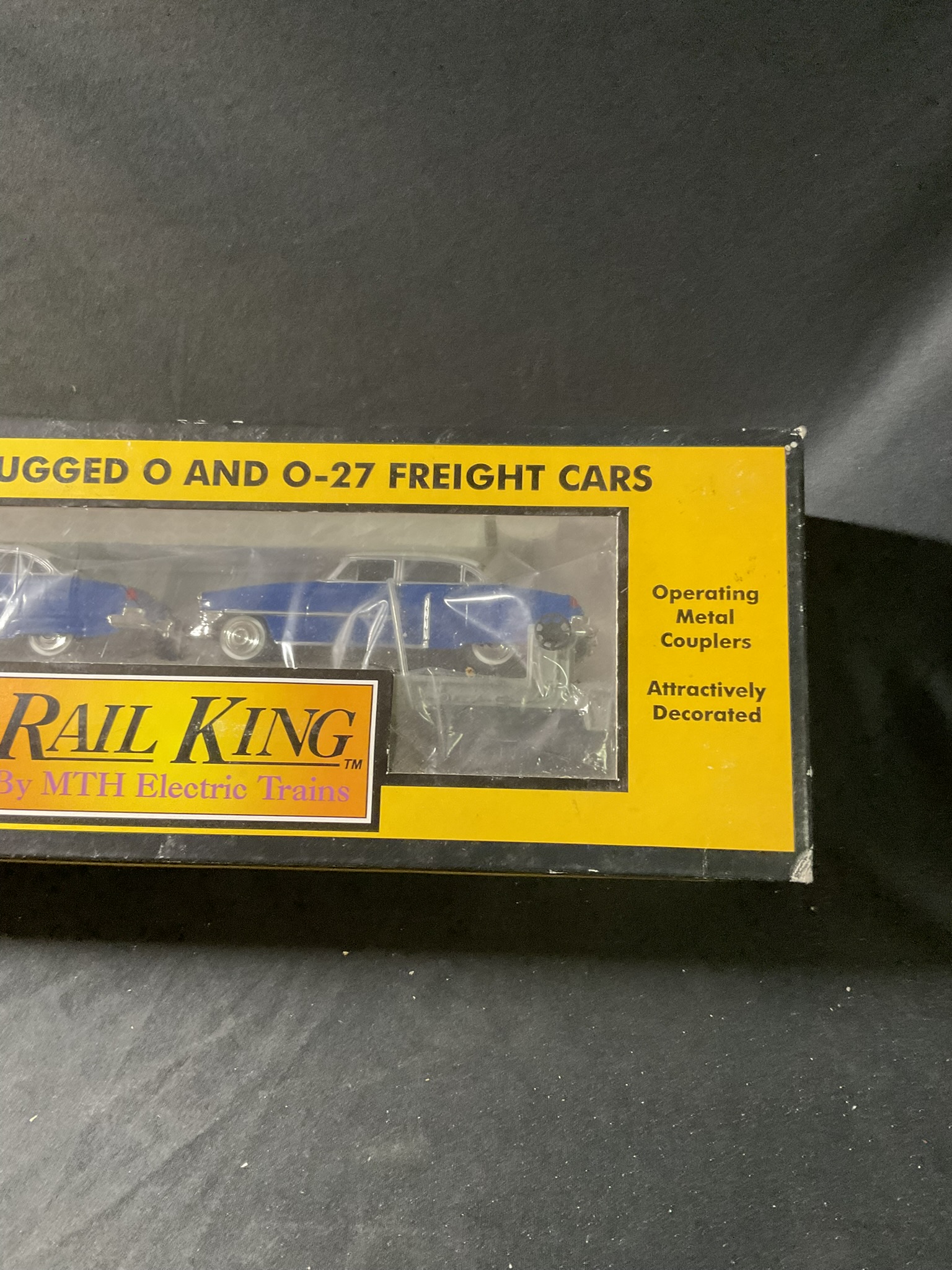 M.T.H. RailKing O-Gauge Semi-Scale Flat Car with a Pair of Ertl 1952 Cadillacs Item RK-7607L
