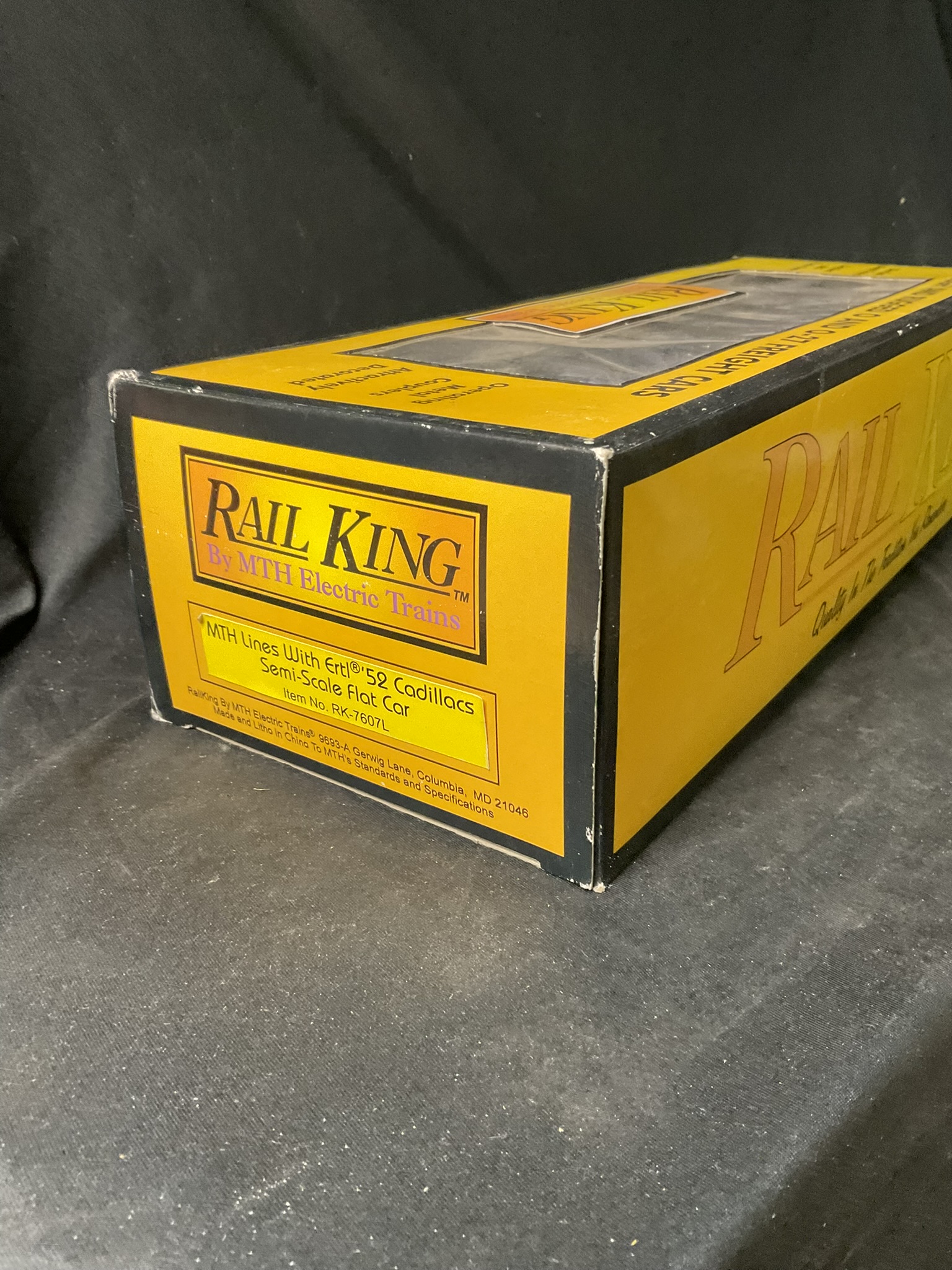 M.T.H. RailKing O-Gauge Semi-Scale Flat Car with a Pair of Ertl 1952 Cadillacs Item RK-7607L
