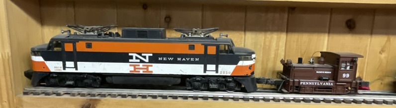 Two Lionel O Gauge Locomotives, Including Postwar New Haven EP-5 No. 2350 and Pennsylvania No. 99 Buckeye Region Switcher