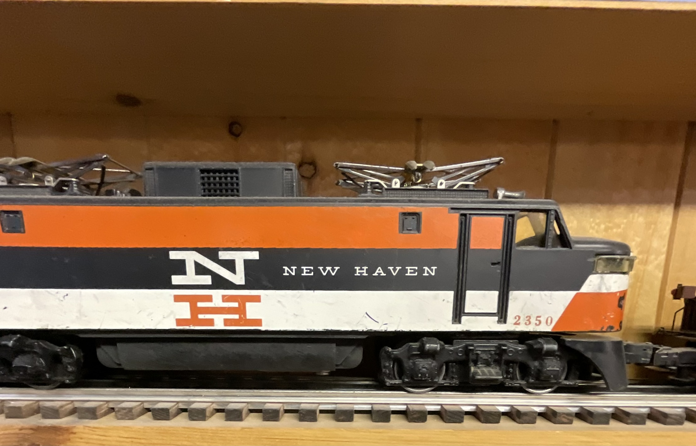 Two Lionel O Gauge Locomotives, Including Postwar New Haven EP-5 No. 2350 and Pennsylvania No. 99 Buckeye Region Switcher