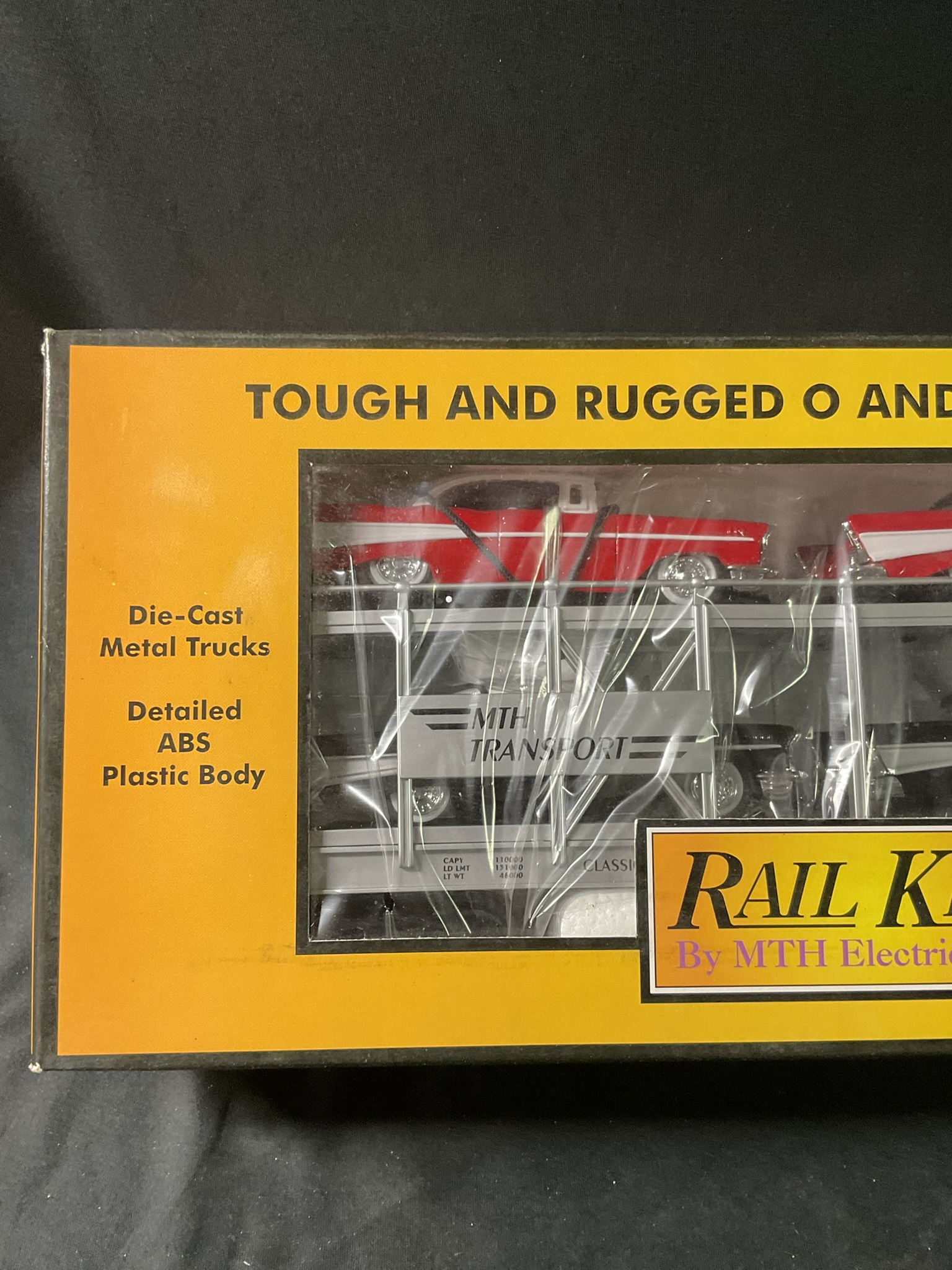 RailKing by MTH Electric Trains O-Gauge Auto Transport with Ertl 1957 Chevrolets