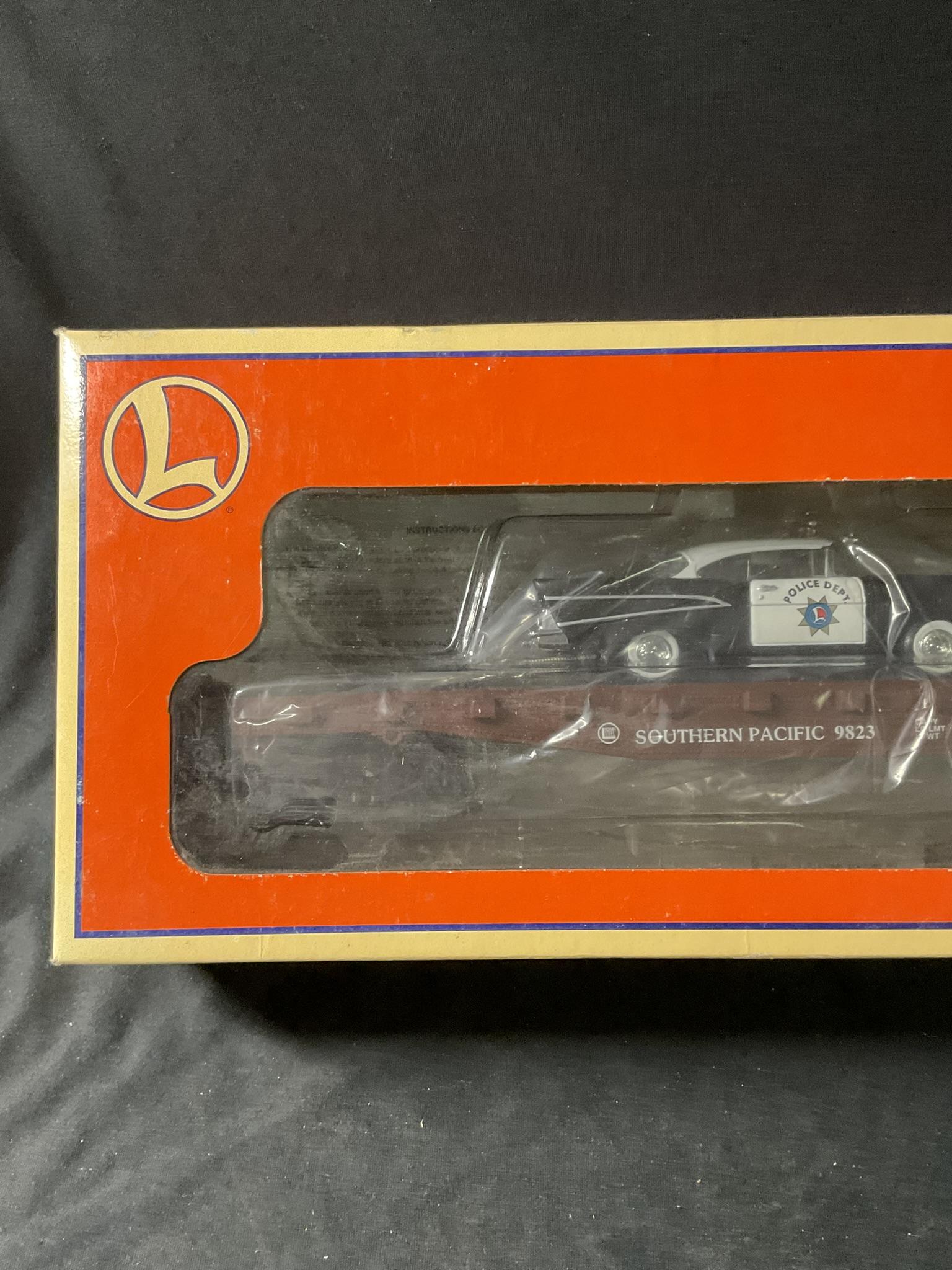 Lionel 6-26906 Southern Pacific Flatcar with Corgi 57 Chevy Police Car